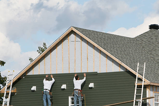 Professional Siding Installation technician working in Bannock, OH